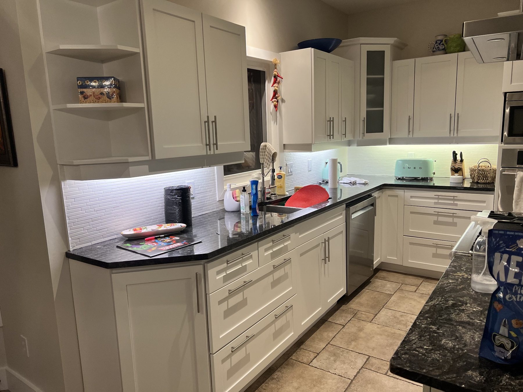 White kitchen cabinet refinishing project by Procut Painters in Kitchener-Waterloo